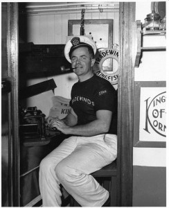 Stan Allyn aboard the Kingfisher. Allyn was also a maritime writer and, for a time, a coastal correspondent for the Oregonian.  Supposedly he did much of his writing aboard the Kingfisher. This photo is LCHS #2695 (Image courtesy of Lincoln County Historical Society) 