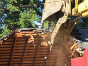 Demolition of 3419 NE 35th Place (photo courtesy of Barbara Strunk)